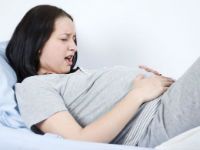 Болить низ живота при вагітності 34 тижні, причини болю