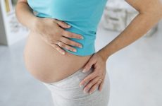 Що робити, якщо тягне поперек на ранньому терміні вагітності — поради досвідчених лікарів