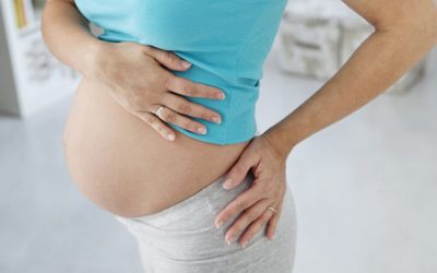 Що робити, якщо тягне поперек на ранньому терміні вагітності — поради досвідчених лікарів