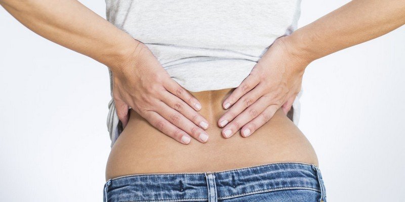 Боль в спине в области поясницы: причины и методы лечения