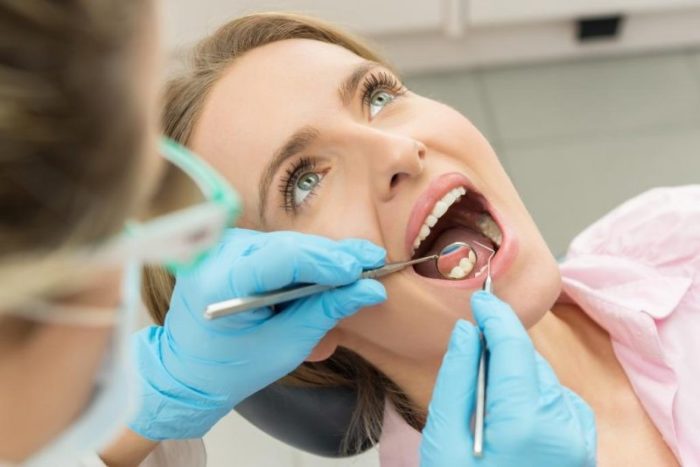 Почорнів зуб під пломбою: причини і методи лікування