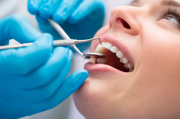 Зуб реагує на холодне після пломбування: причини і лікування